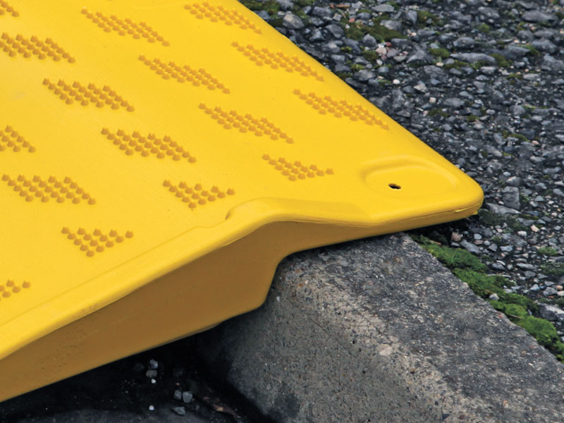 Plastic kerb ramp for mobility scooters, wheelchairs and cars