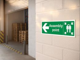 "Fire Assembly Point" Arrow Left Sign