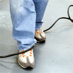 Avoid trip hazards by using floor covers and cable protectors