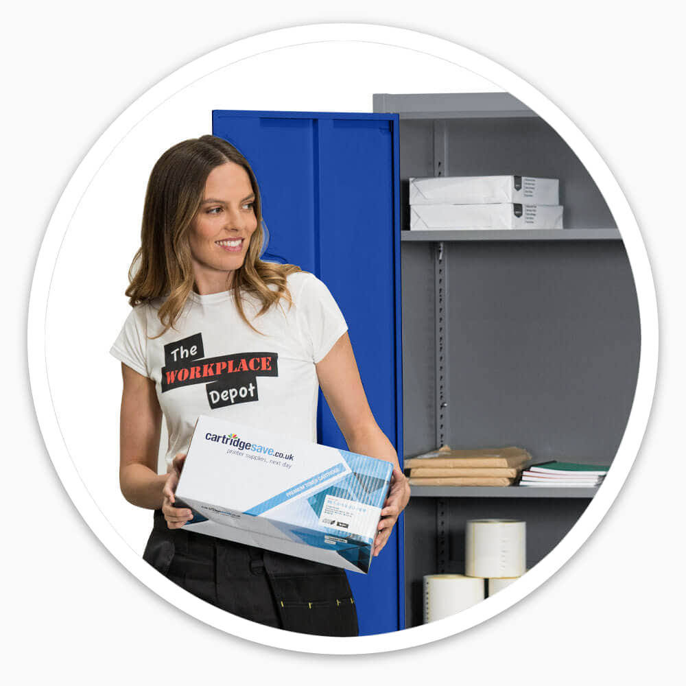 Smiling Workplace Depot staff member holding a box beside the open blue Garage Storage Cabinet, ready for use