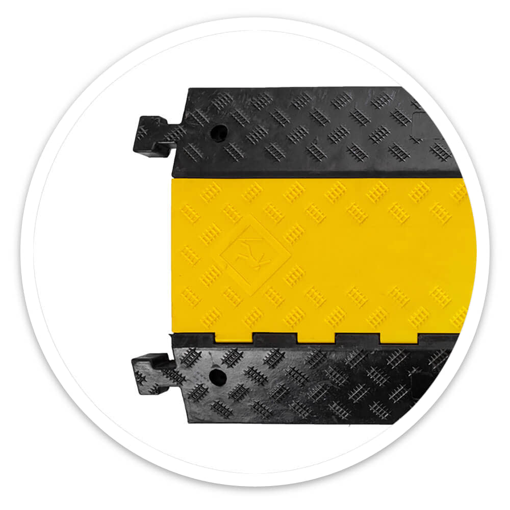 End of the 5 Channel Cable Ramp with jigsaw connectors on its black side ramps and a yellow hinged lid with a non-slip tread