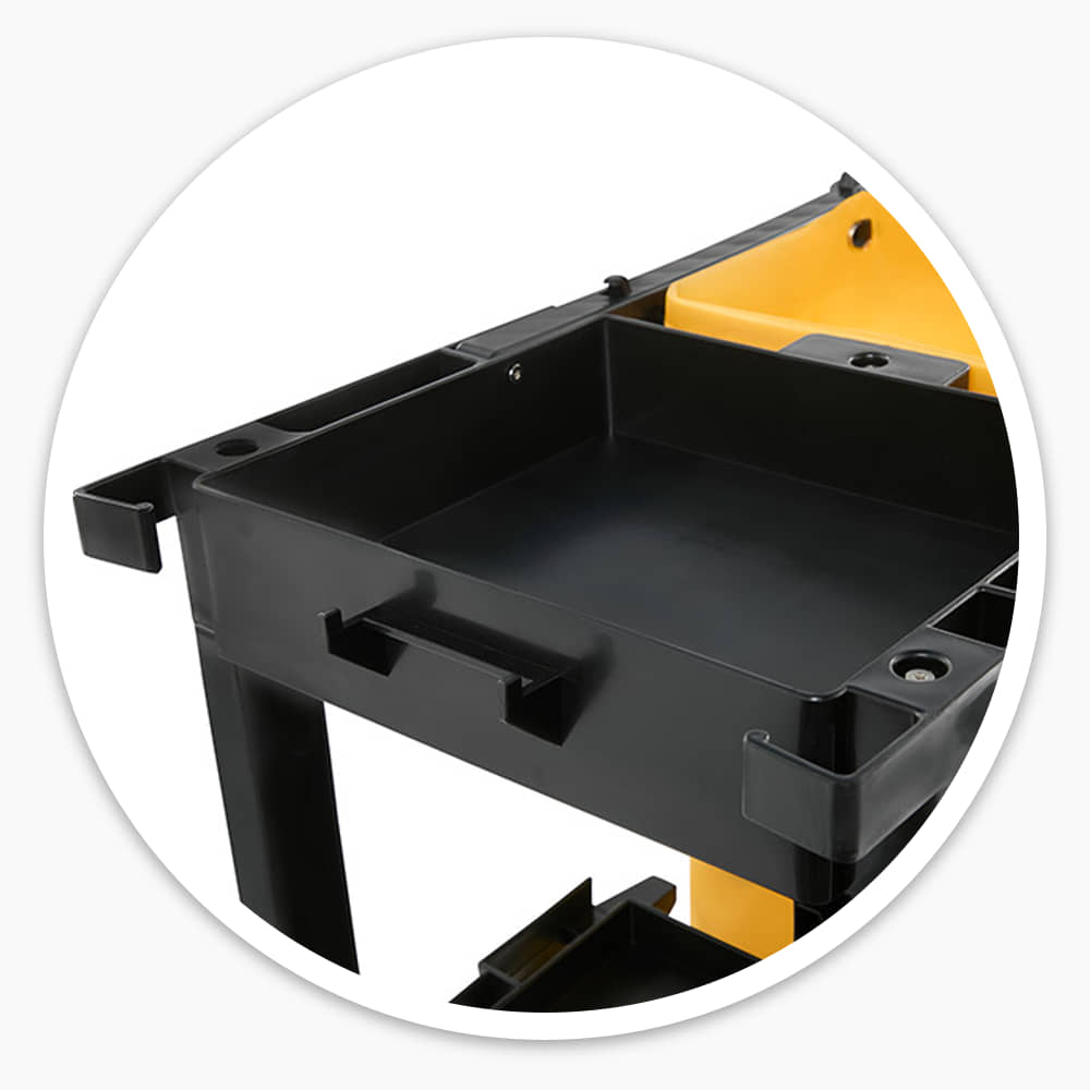 Close-up of the black top tray on the Economy Cleaning Cart next to the yellow waste bag frame