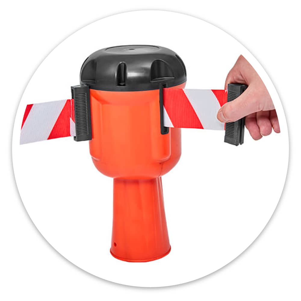 Hand clipping the end of a red and white belt into a receiver clip on the retractable cone topper