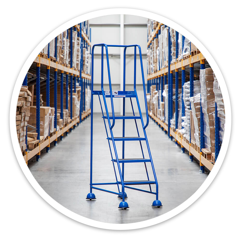5 Tread Mobile Safety Steps standing on cupped feet in a warehouse racking aisle