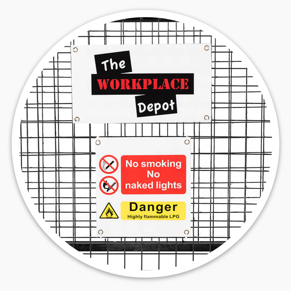 Front of a black gas cylinder cage with No Smoking and Danger Highly Flammable LPG hazard signs