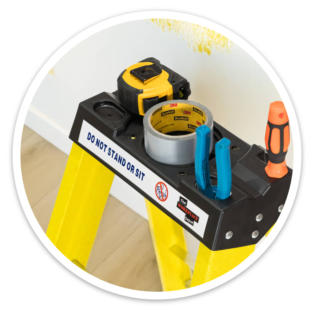 Tool tray of the 4 Tread Fibreglass Step Ladder holding a tape measure, tape roll and screwdriver