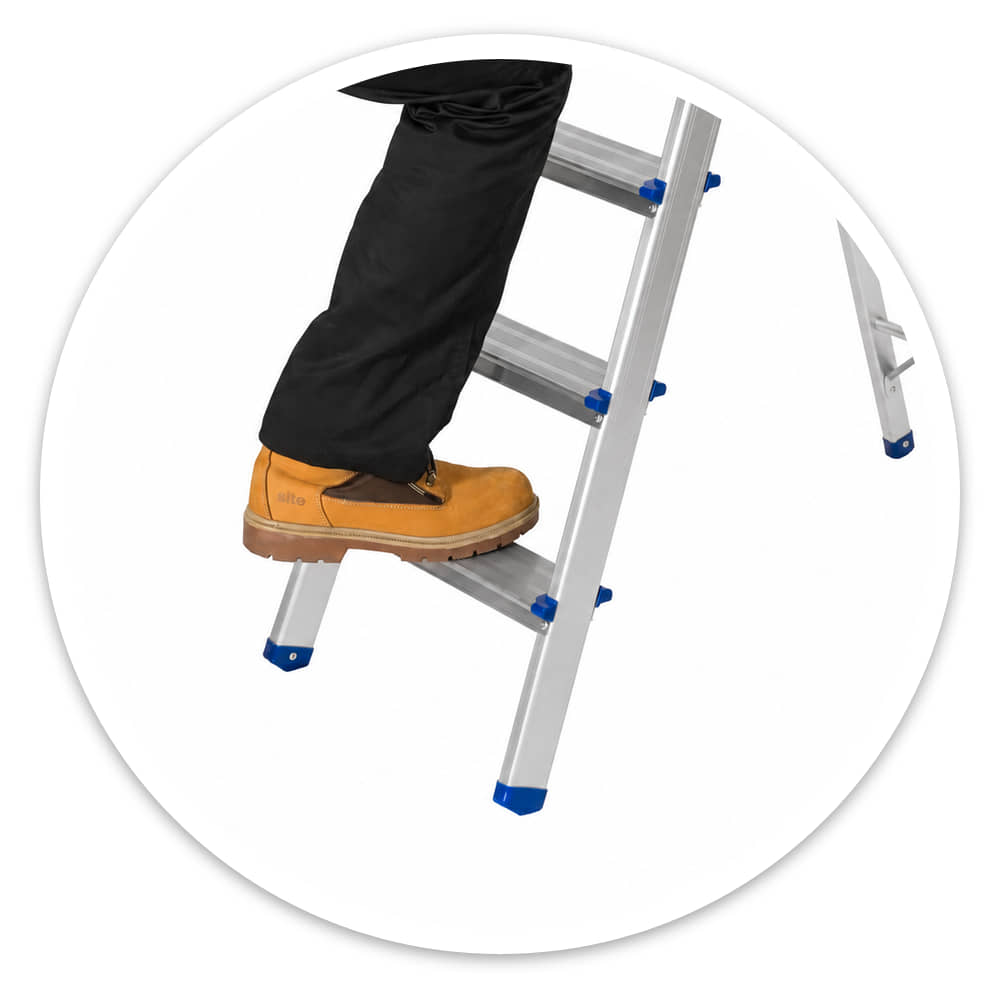 Work boot on the wide anti-slip bottom tread of the 5 Tread Lightweight Aluminium Step Ladder