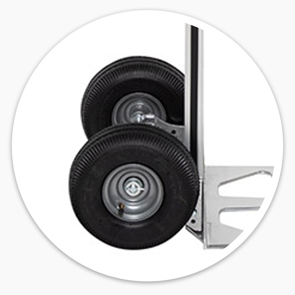 Side view of the aluminium sack truck showing its two black pneumatic rubber wheels, toe plate and curved handle with grip