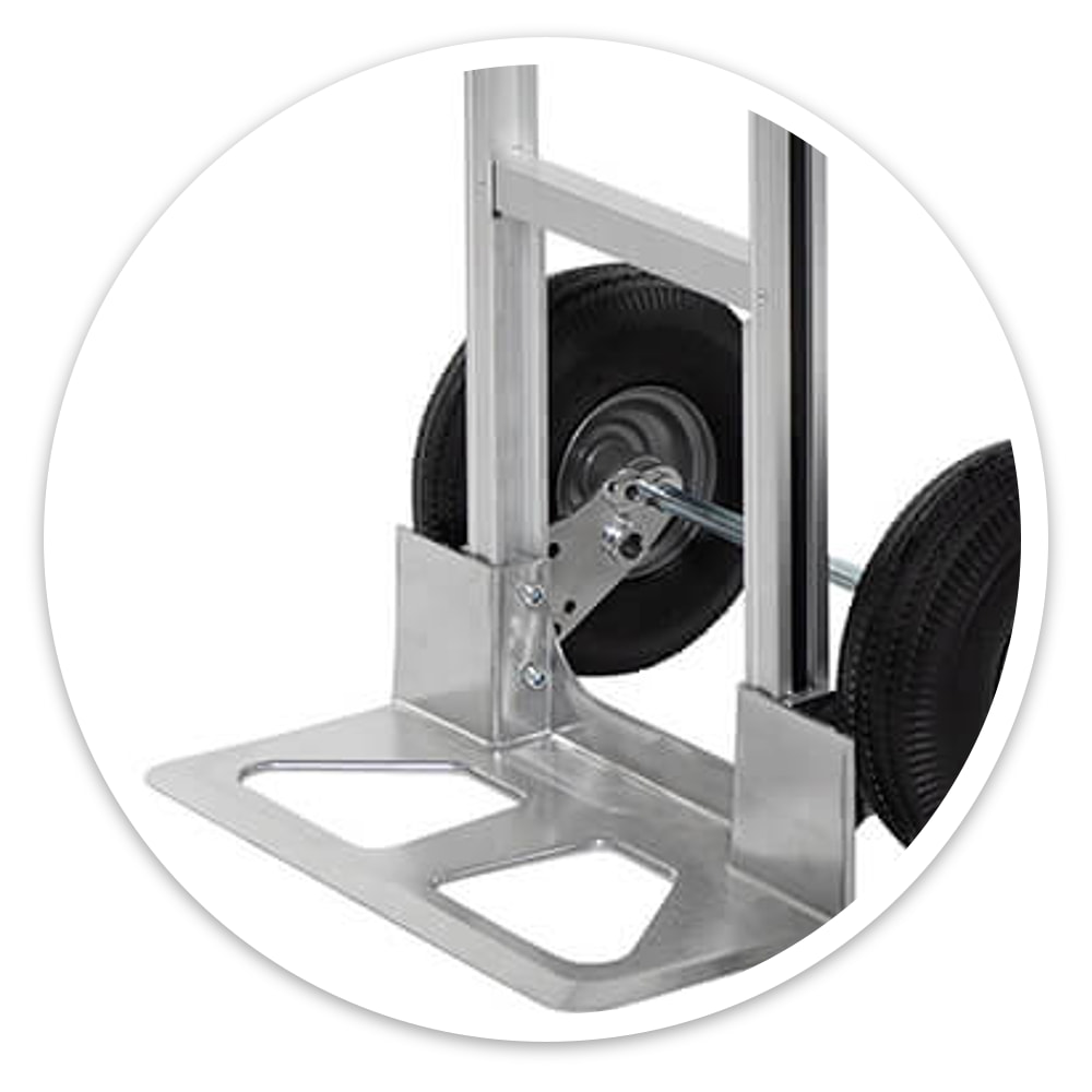 Aluminium sack truck with pneumatic tyres, twin handles and a wide base plate at the foot, on a white background