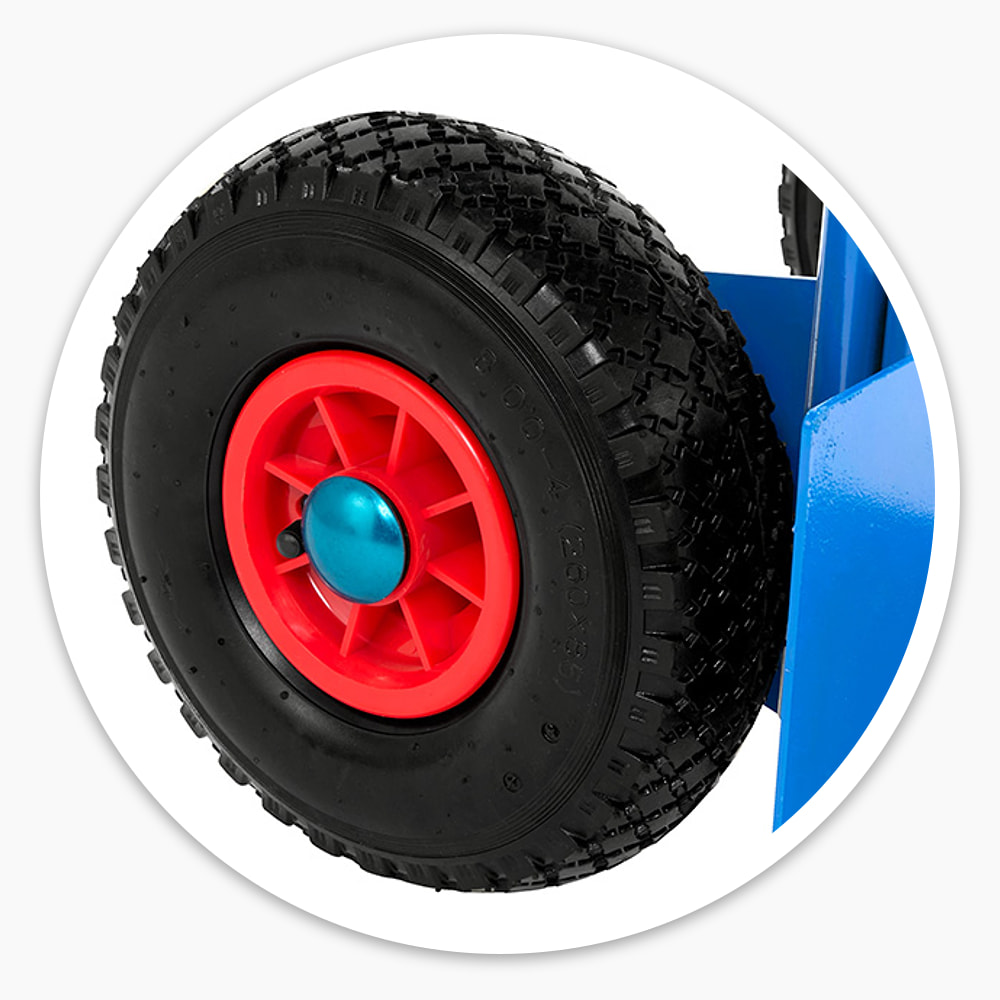 Close-up of a 250mm pneumatic wheel with red hub on the Chair Moving Trolley