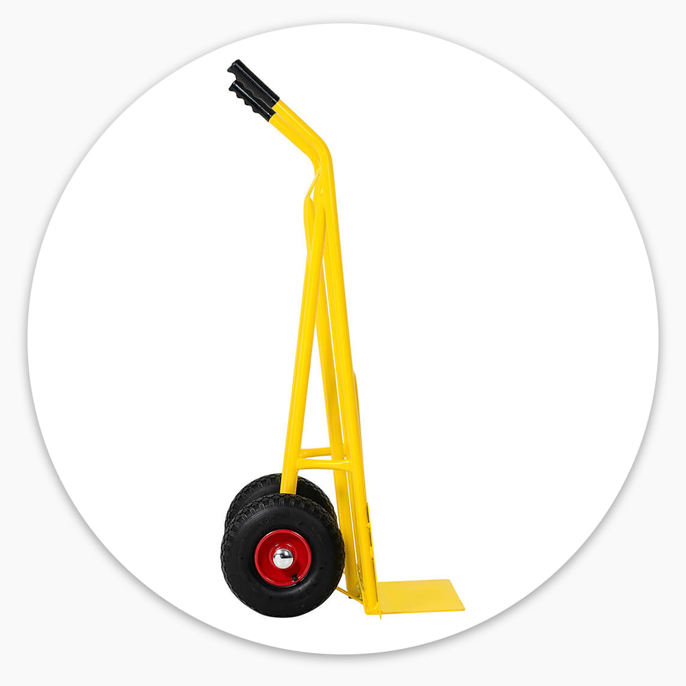 Side view of the yellow welded steel frame of the Delivery Trolley with Folding Toe Plate, with black grips and pneumatic wheels