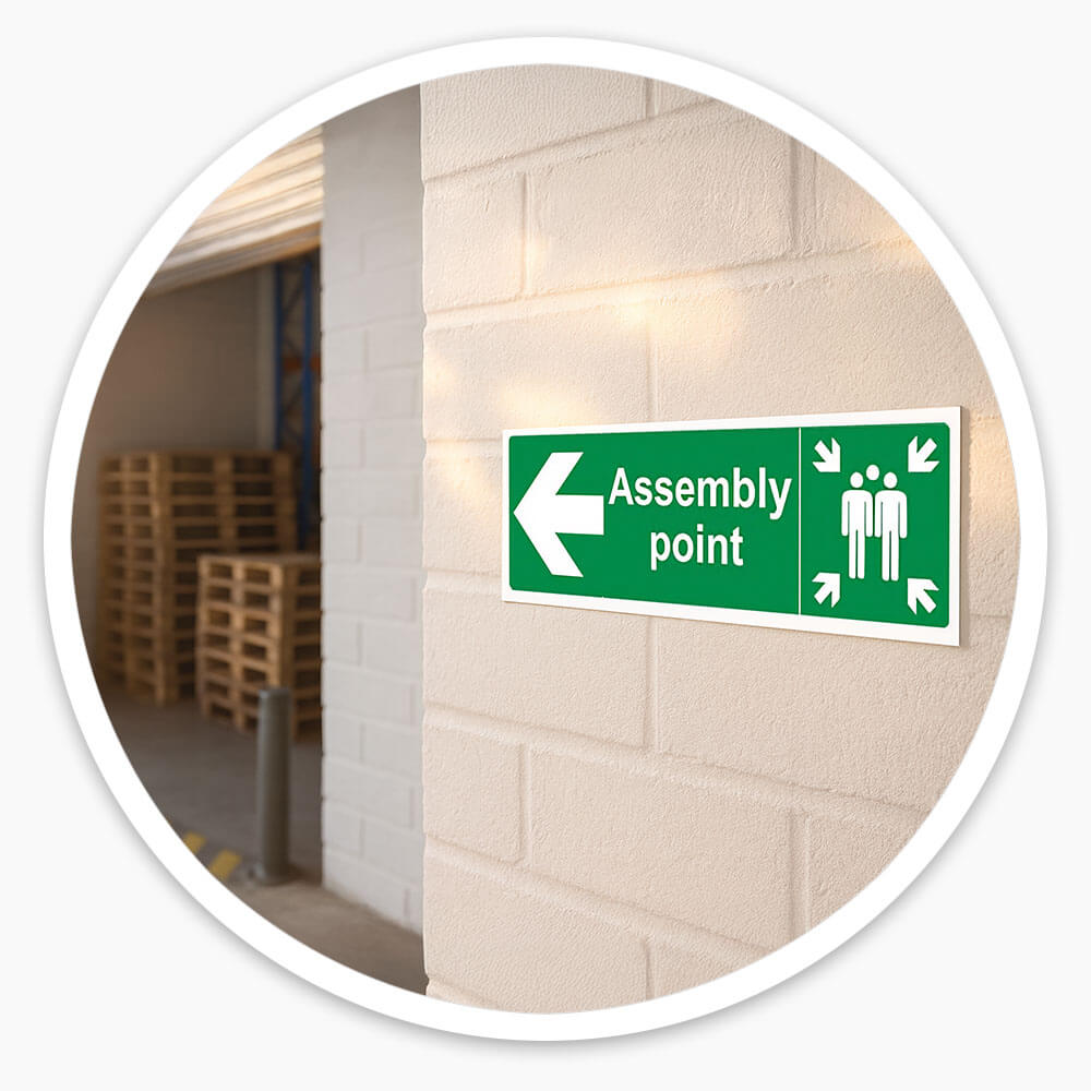 "Fire Assembly Point" Arrow Left Sign