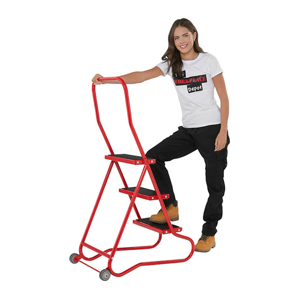 Woman resting a hand on the grab handle of the 3 Tread Wheelalong Mobile Steps on a white background