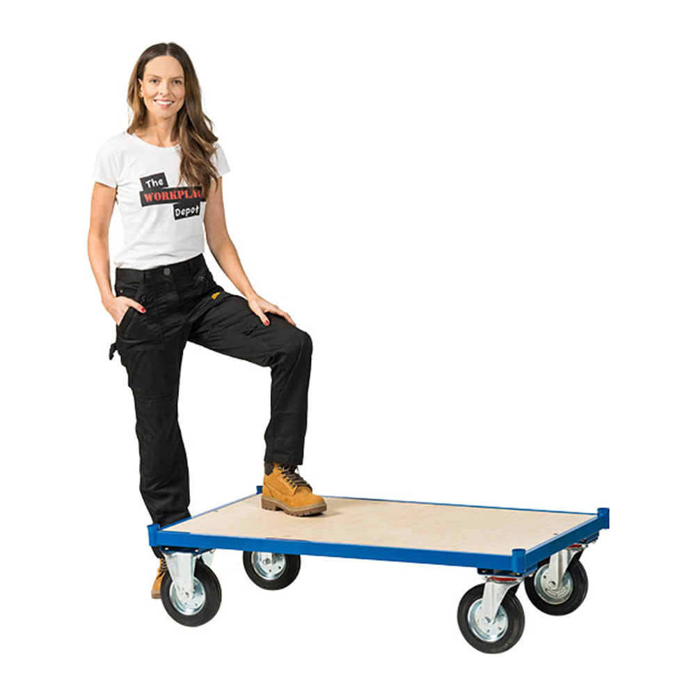 Woman resting her boot on the deck of the Platform Dolly Cart to show its strength