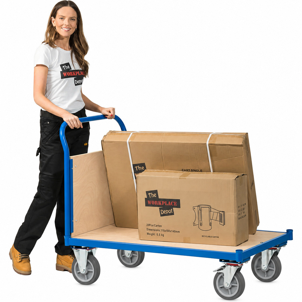 Woman pushing the Flatbed Trolley carrying large cardboard cartons