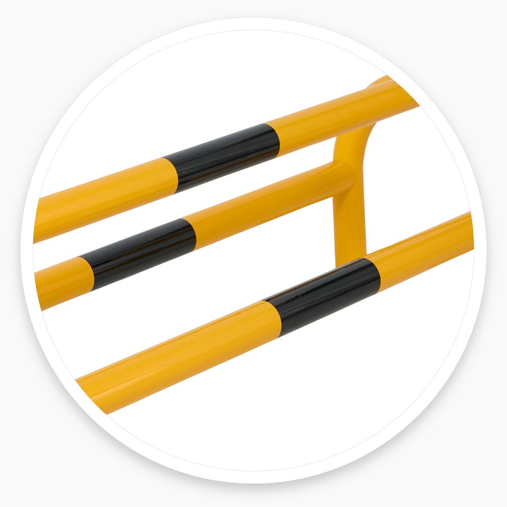 Yellow and black Pipe Protector mounted around pipework in a car park